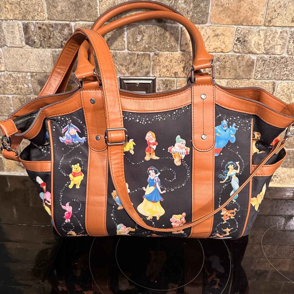 Bradford exchange Disney “carry the magic” handbag